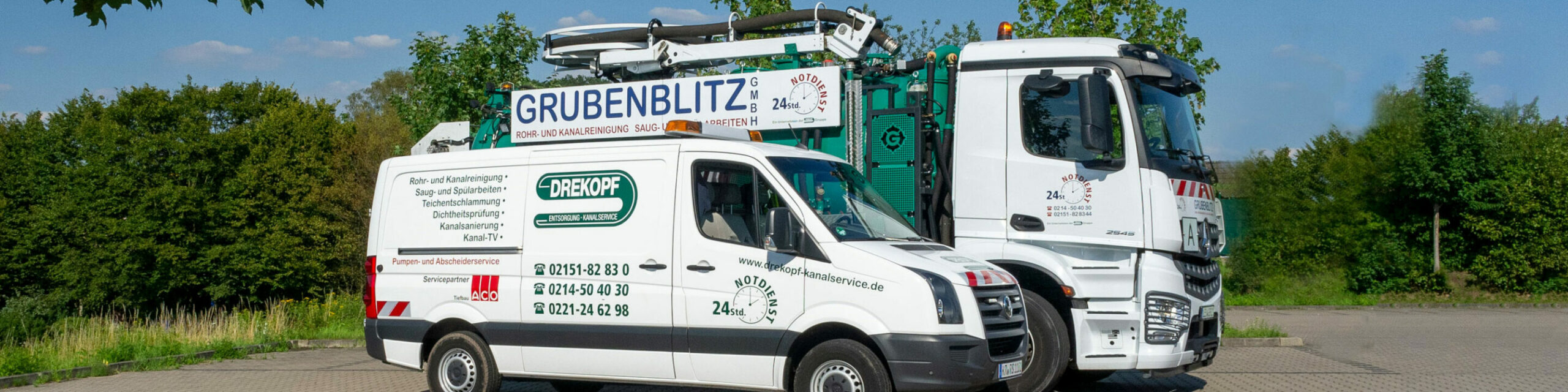 Servicefahrzeuge der Firma Grubenblitz und Drekopf